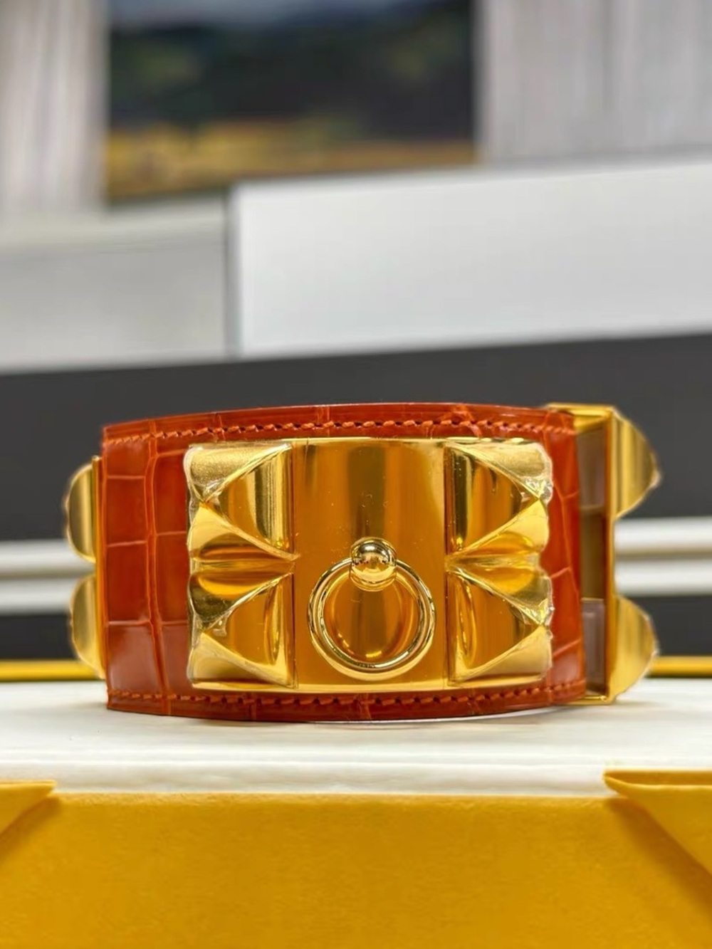 Hermes Croc-Embossed Orange Leather Bracelet with Gold Hardware